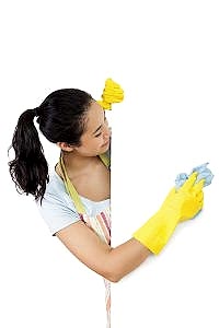 laughing woman who washes plate form side